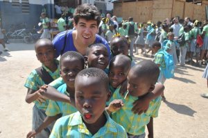 Colin Briggs with children of Haiti